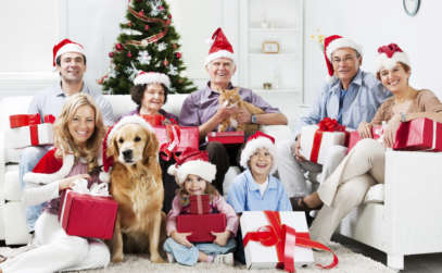 a family posing for a Christmas photo