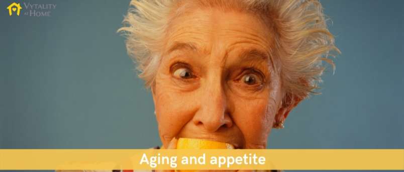 Senior lady eating lemon for healthy eating