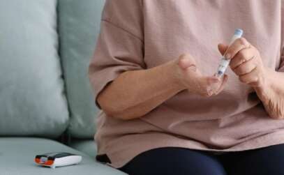 senior woman with diabetes checking insulin level